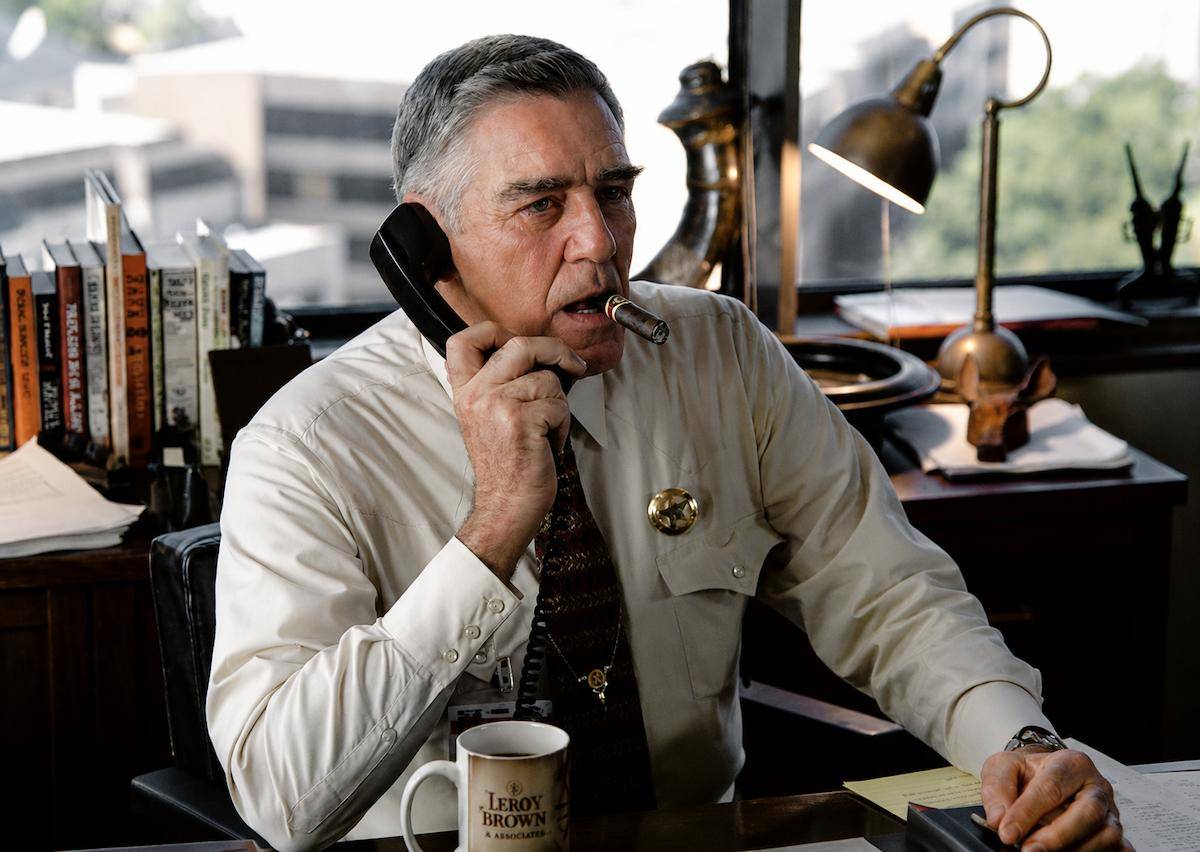 R. Lee Ermey talking on the phone and smoking a cigarr for a scene in Man in the House. -