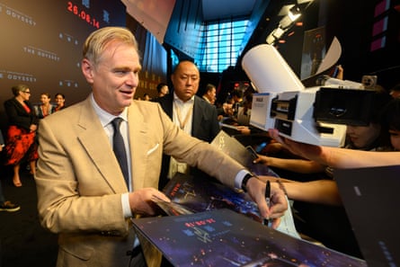 Christopher Nolan signs autographs at the China National Film Museum premiere last month.