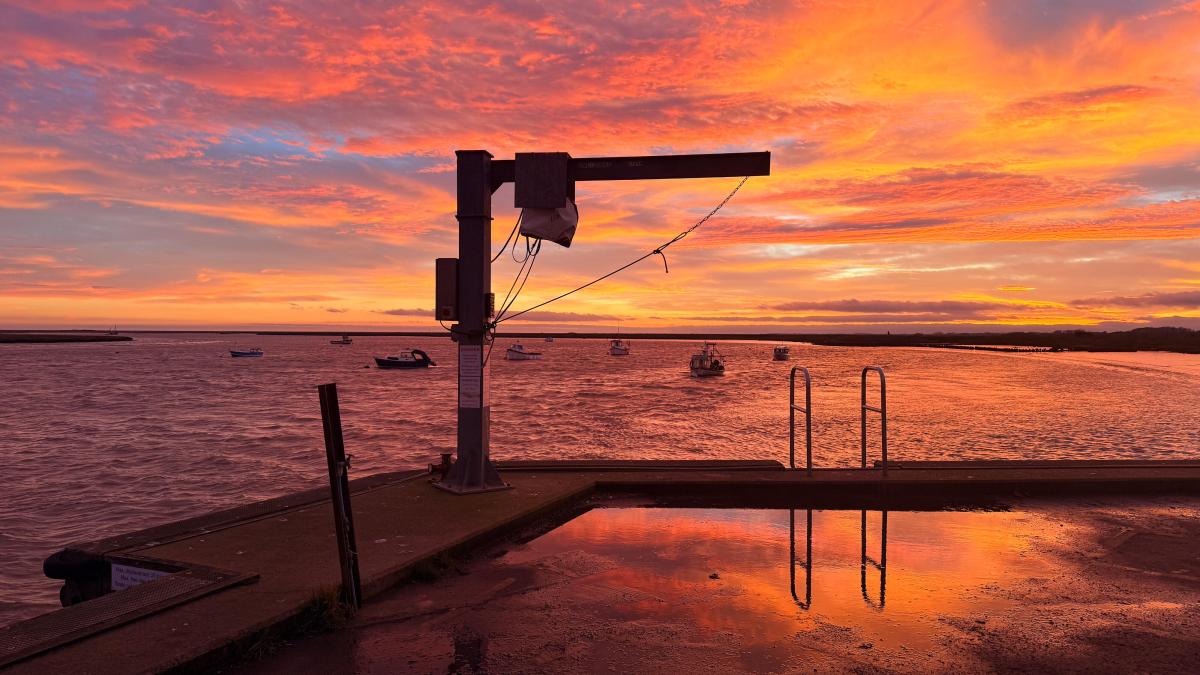 A sunset on a pier