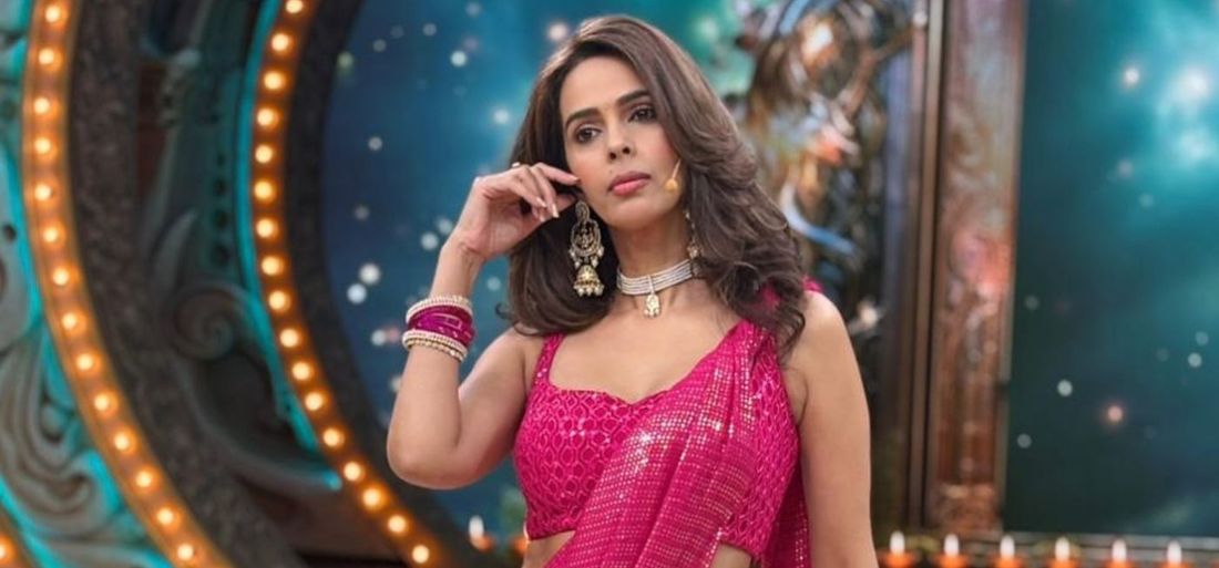 Mallika Sherawat wearing Pink