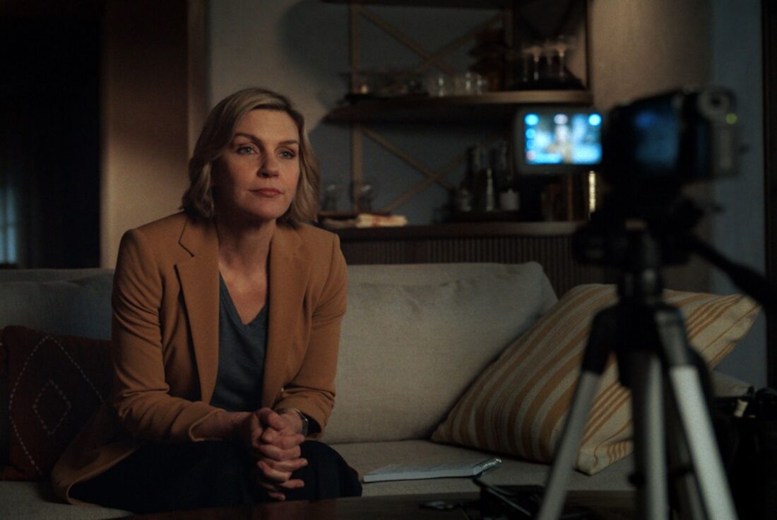 Carol in her home, talking into a camcorder to record a message in Pluribus S1