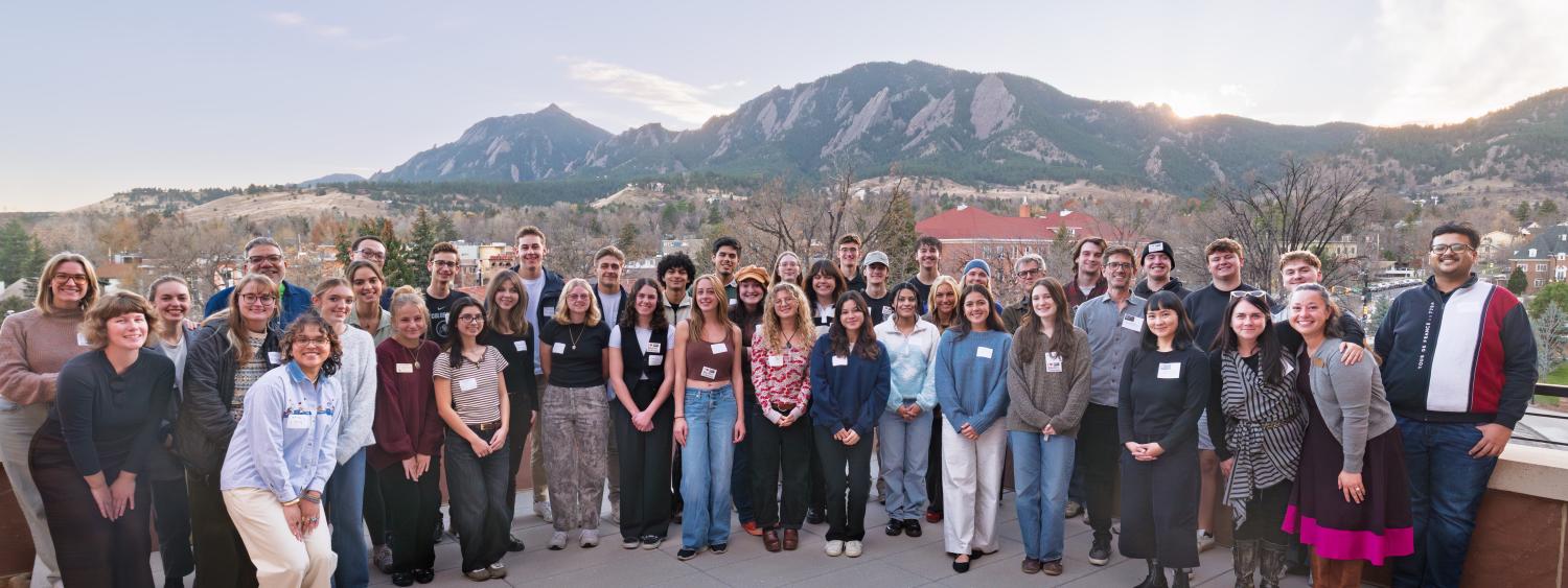 Sundance Film Festival executives and CU Boulder students pose for group photo outside their meeting room at the CASE building