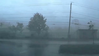 Police officer in the middle of tornado caught on terrifying dashcam