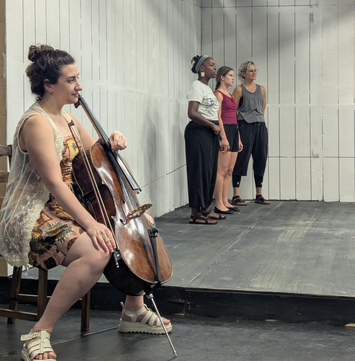 To A Flame in rehearsal, L-R: cellist Beth Silver, actors Nickeshia Garrick, Juliana Monk & Dawn Jani Birley (Photo: Dahlia Katz)